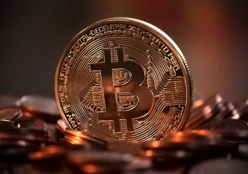 John McAfee 500.000 dollárra jósolta a bitcoint